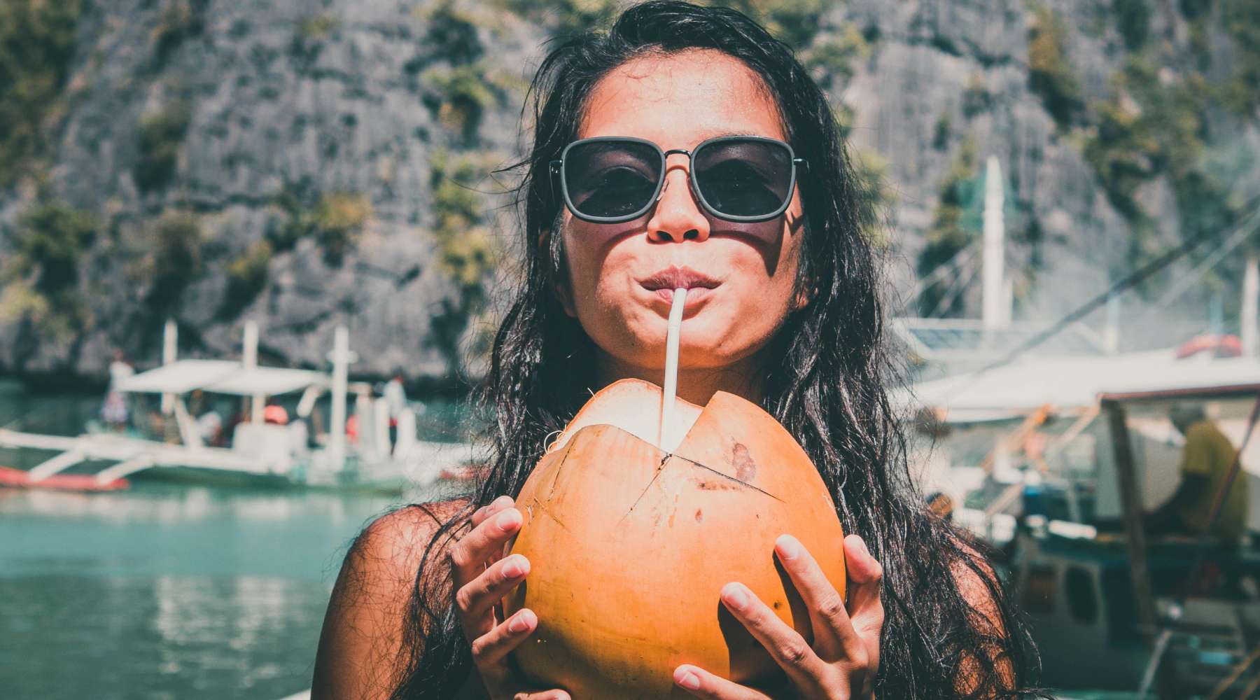WomanWithCoconut_Pexels_1800x1000.jpg